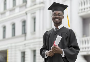 medium-shot-smiley-graduate-student