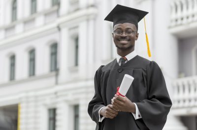 medium-shot-smiley-graduate-student